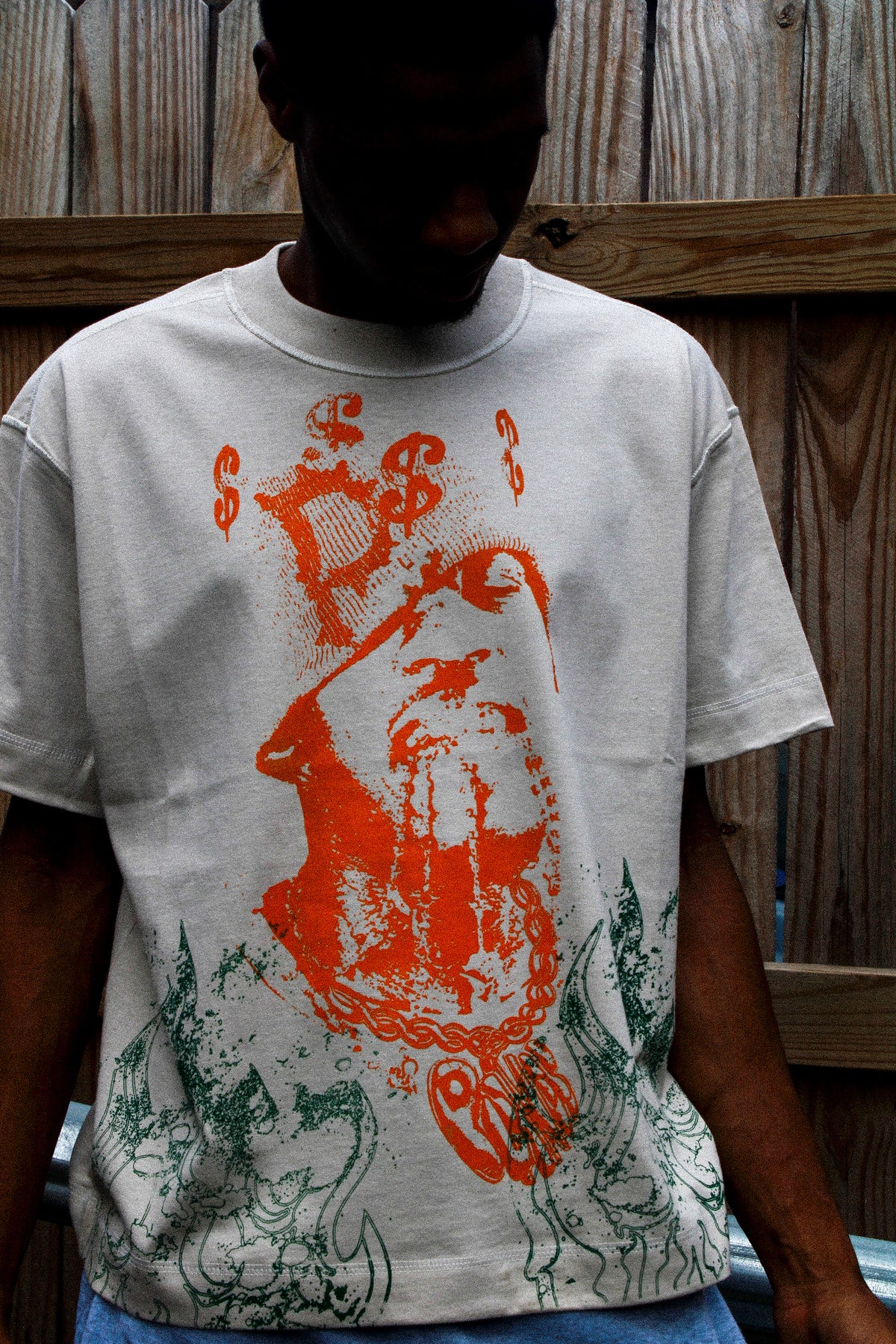 Orange/Green “Red Man Tee”