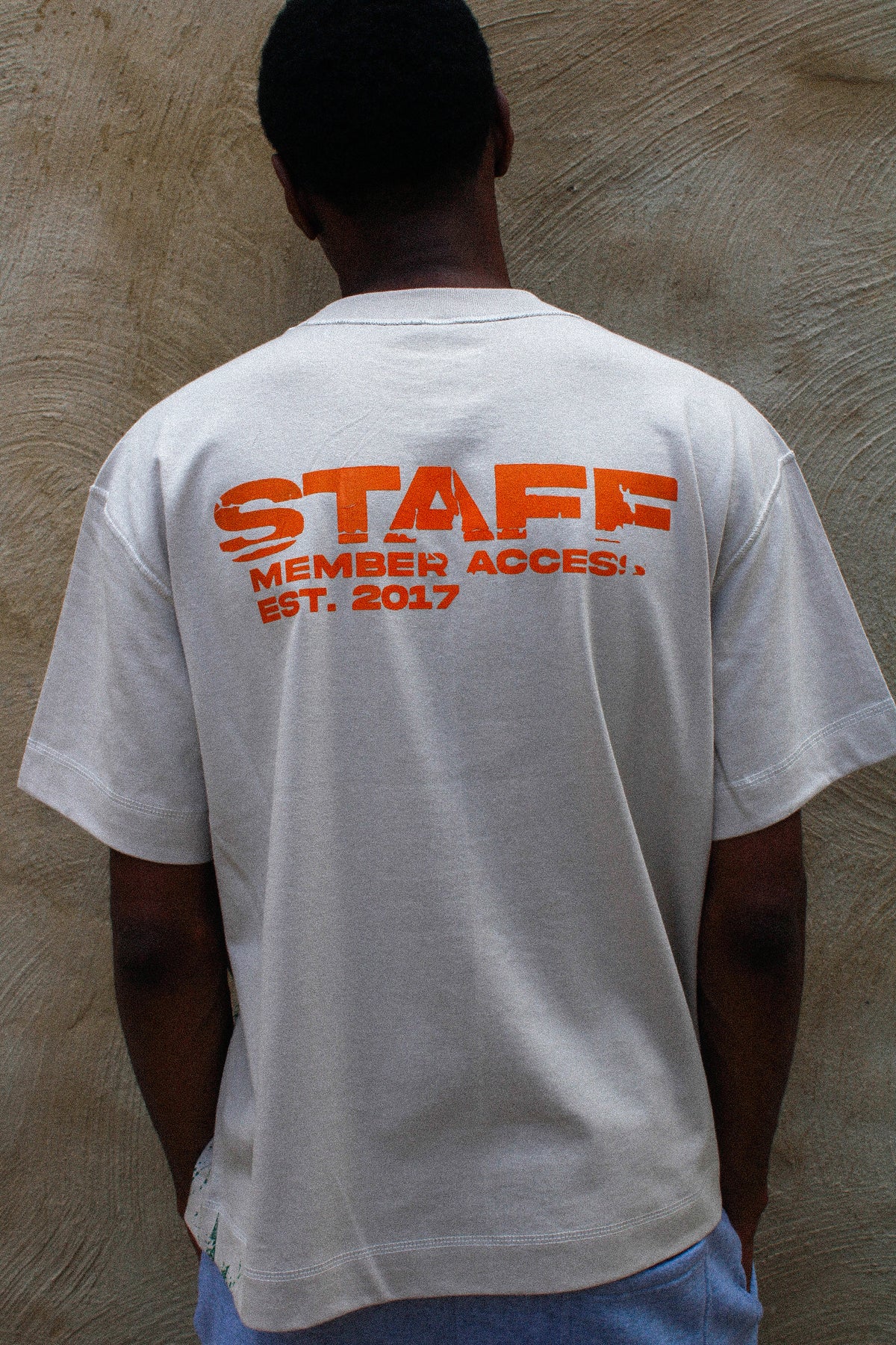 Orange/Green “Red Man Tee”